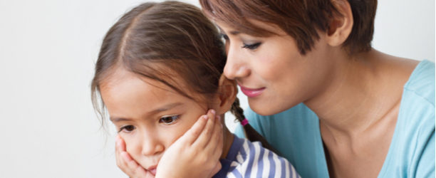 mother comforting upset child